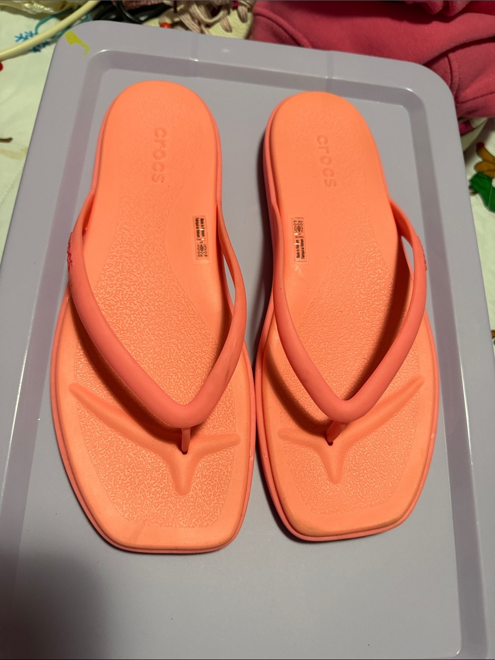 CROCS Women’s Coral/Peach Flip Flop Sandals
